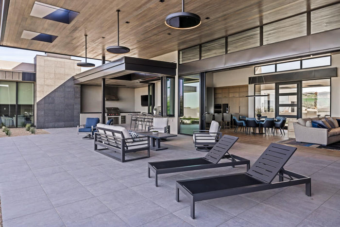 Bromic Eclipse pendant heaters in an architectural outdoor living space
